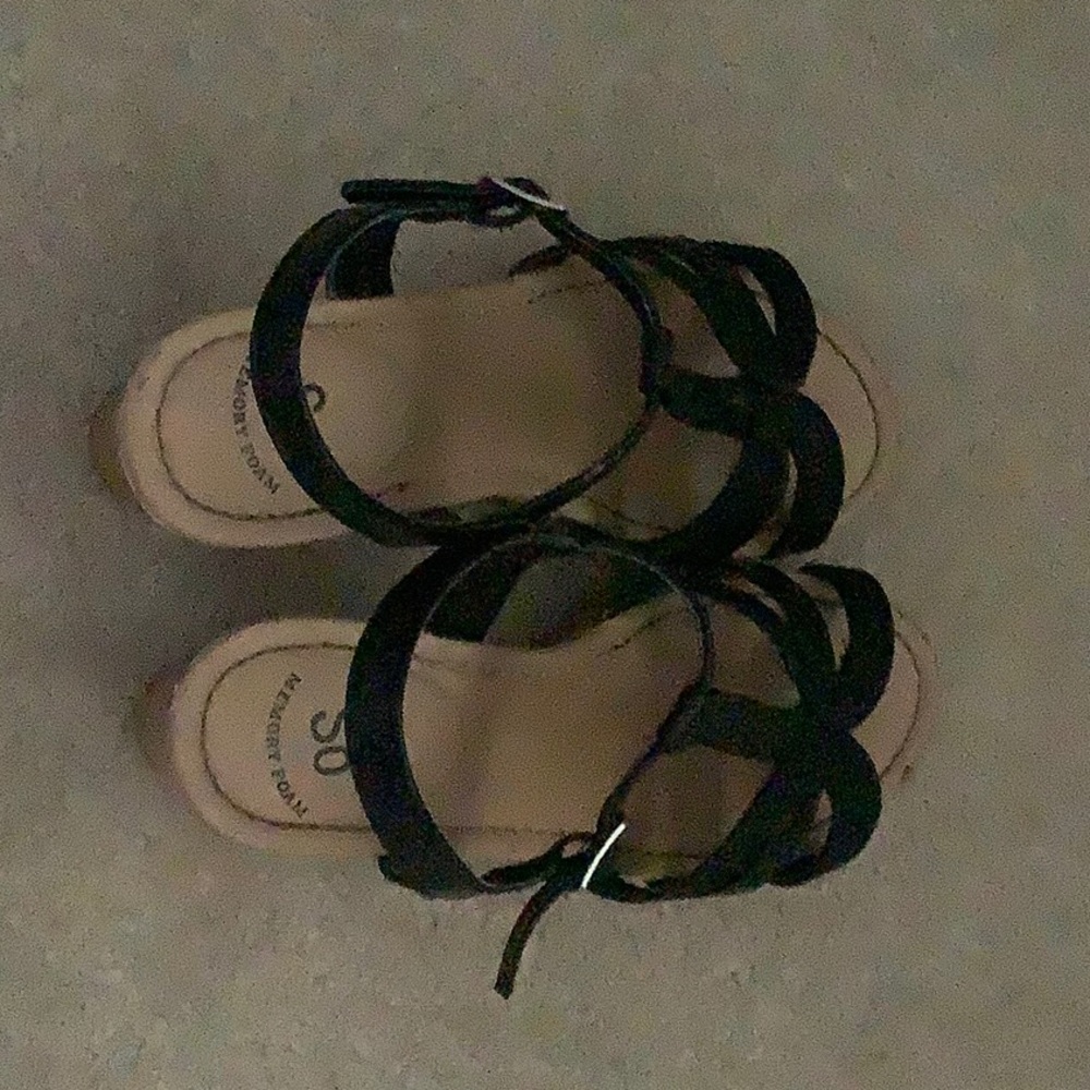 I am selling it tannish black sparkly shoes